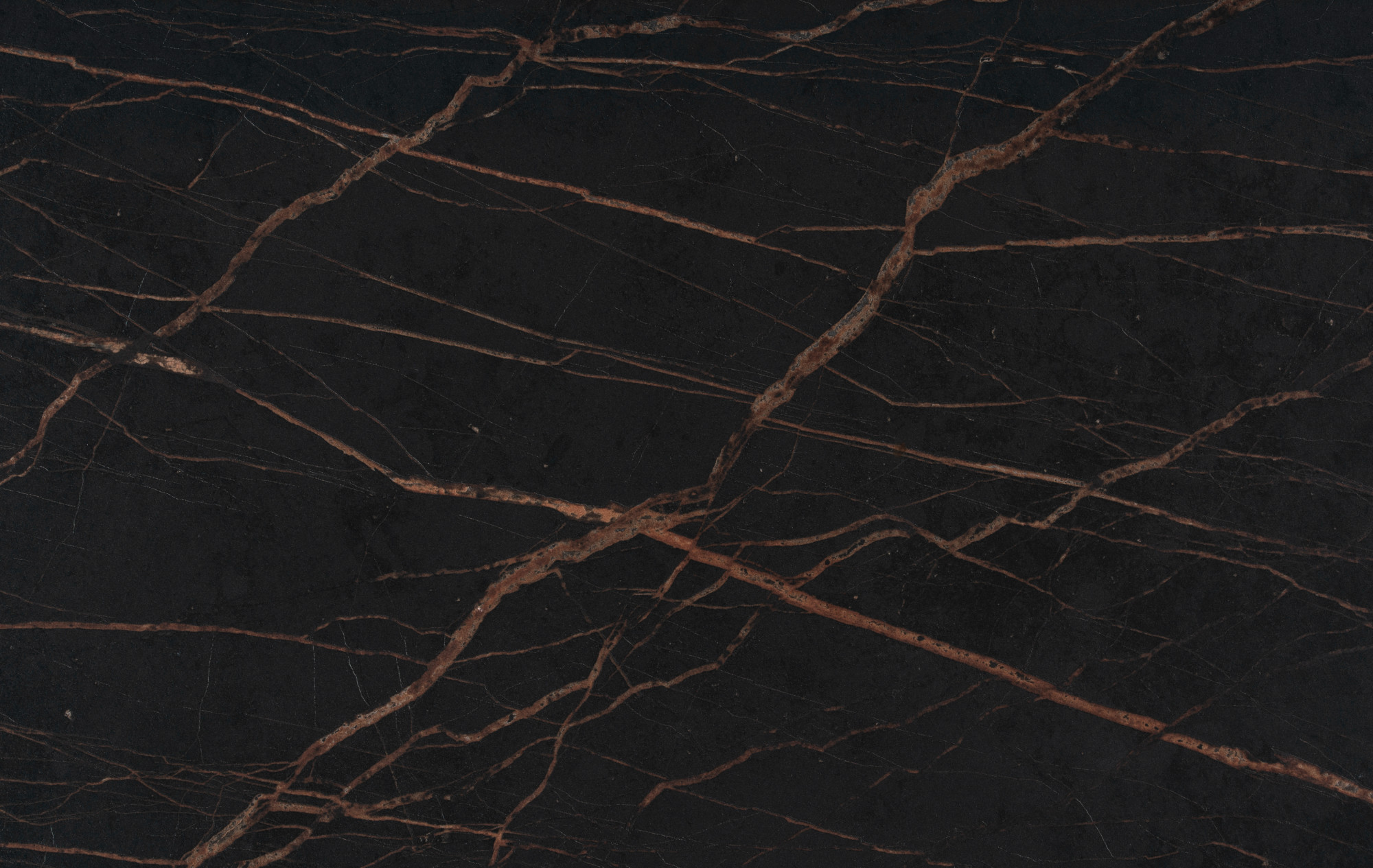 Close-up of Laurent Porcelain worktop surface showing a dark porcelain finish with fine gold veining.