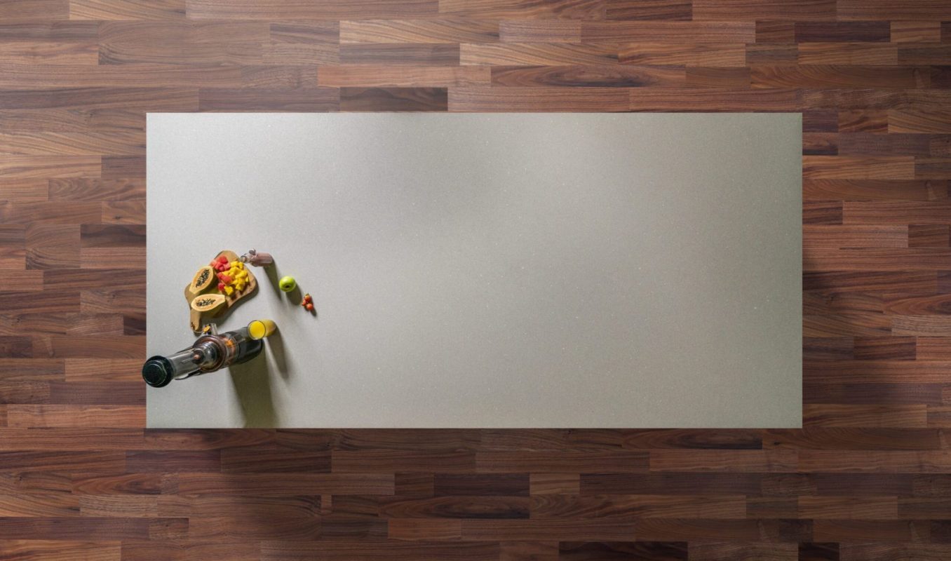 Aluminum Quartz worktop shown from above with light grey surface and subtle fine sparkle across the slab