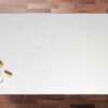 Aspen Shimmer Quartz worktop slab displayed on a wooden surface