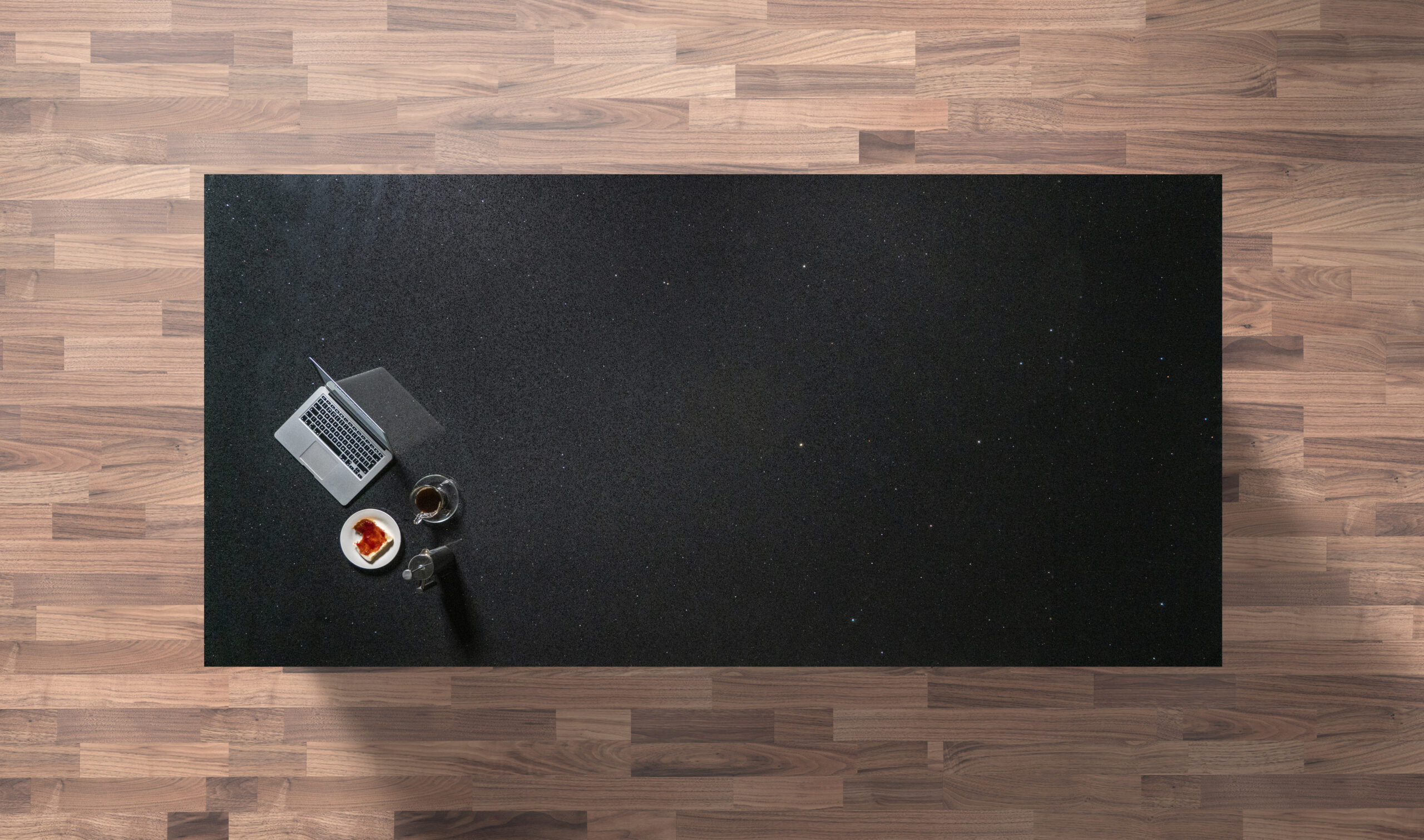 Overhead view of Black Starlight Quartz worktop showing a deep black surface with subtle sparkle