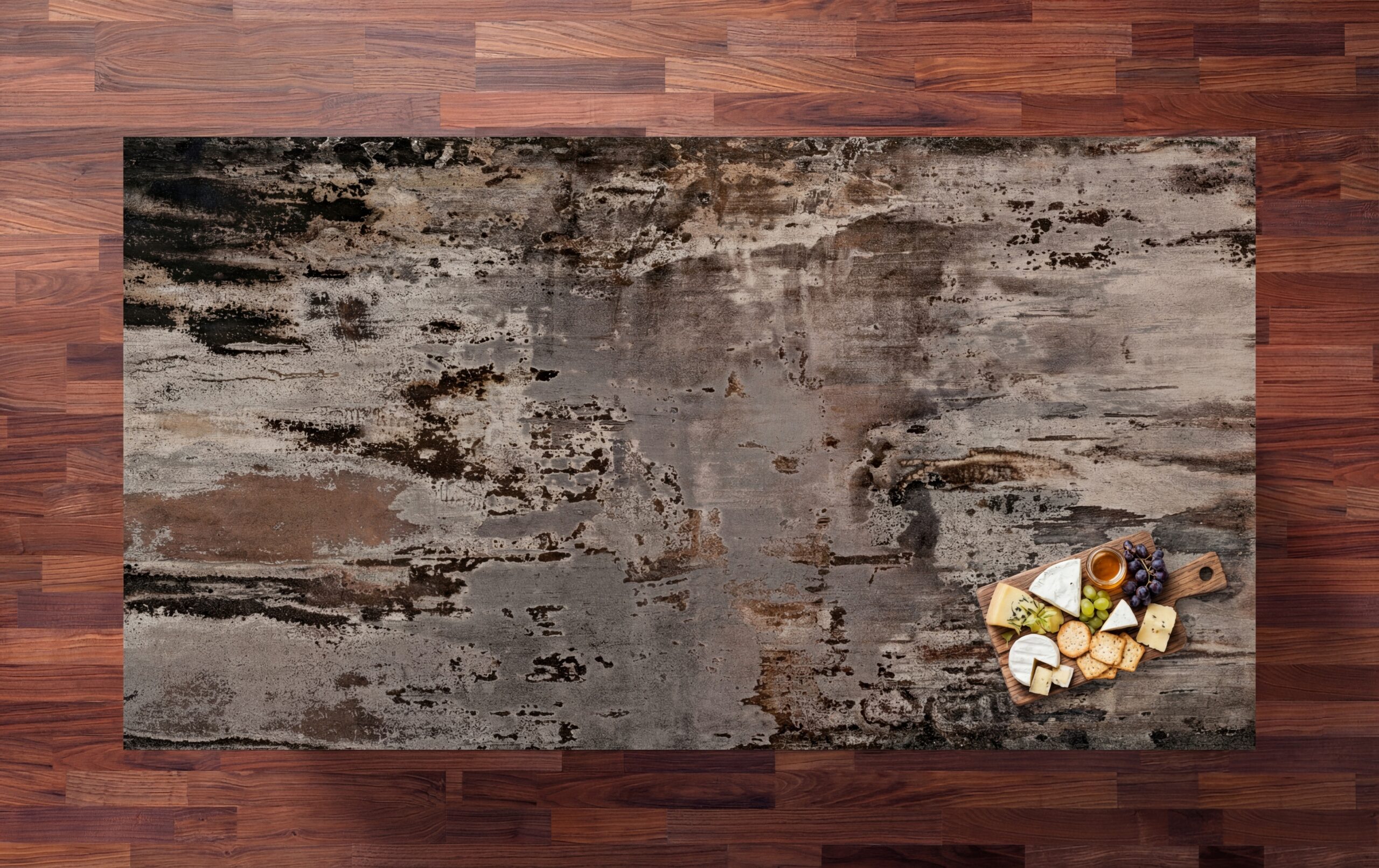 Trilium Porcelain worktop sample on a wooden surface with a small floral detail in the corner