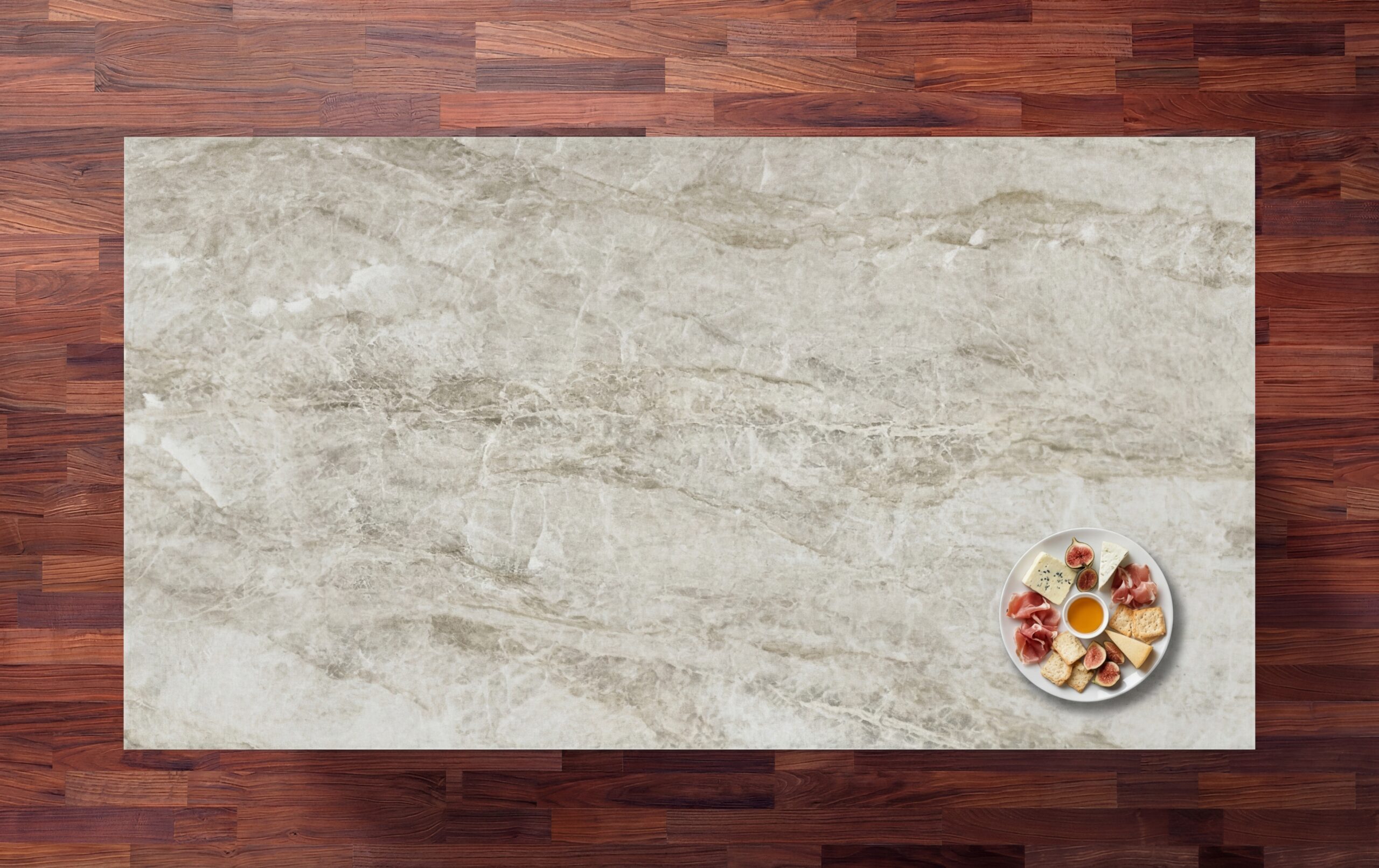 Taga Porcelain worktop slab shown from above with a warm light stone effect surface on a wood background