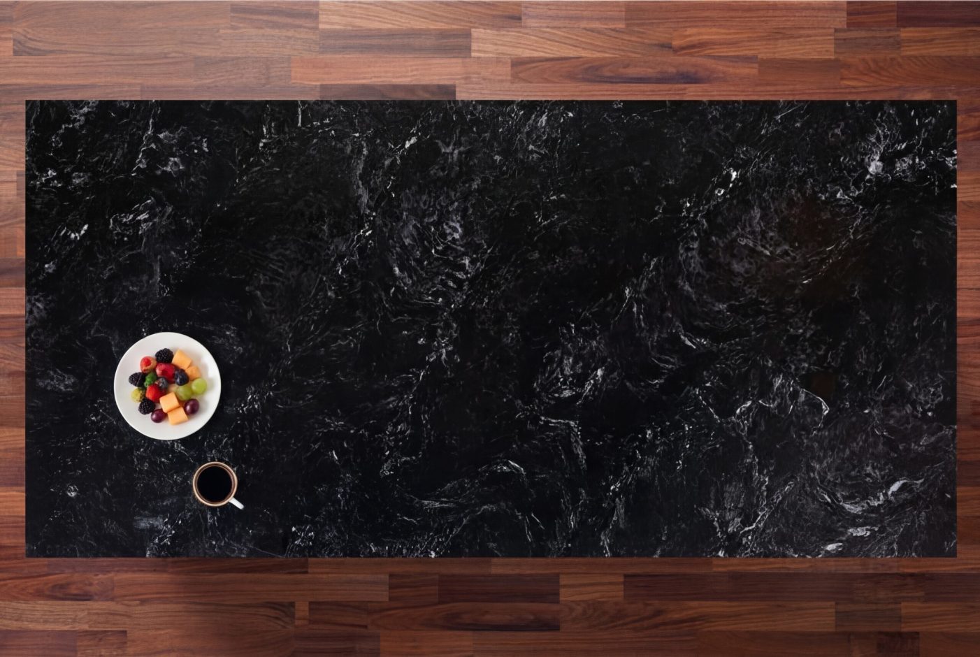 Midnight Black Quartz worktop shown from above with dramatic black stone-effect movement and smoky lighter markings
