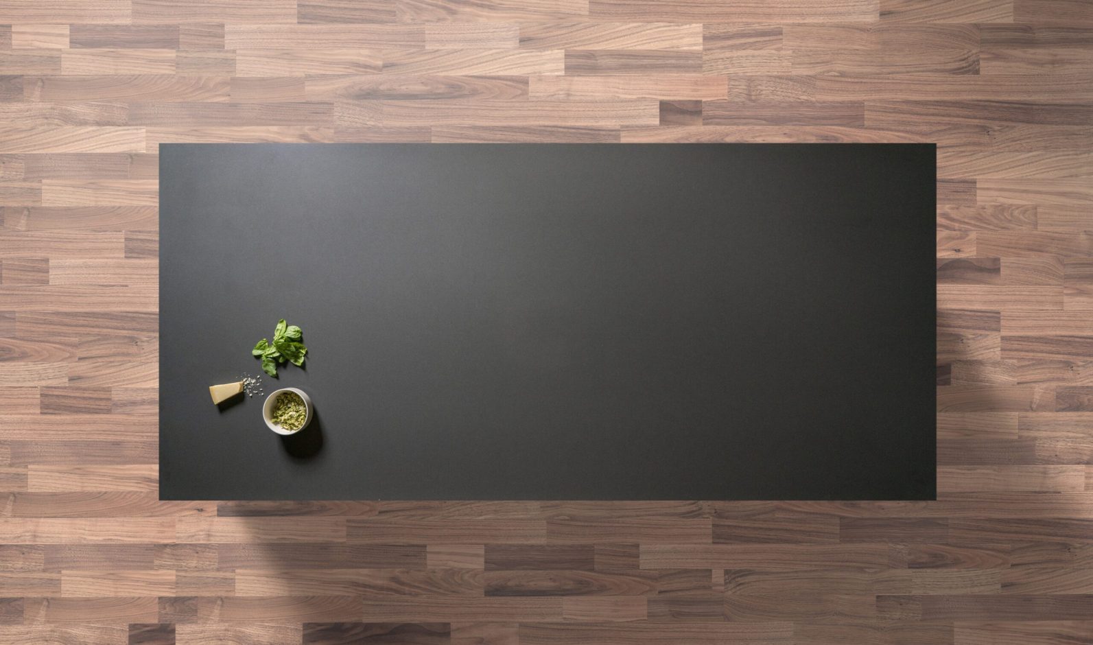 Marengo Quartz worktop shown from above with deep charcoal grey surface and a smooth, uniform finish across the slab