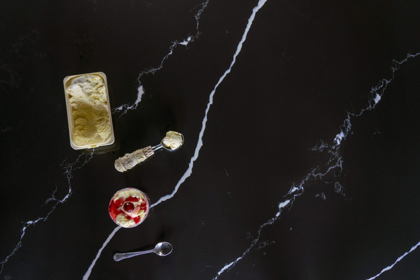 Nero Marquina Quartz worktop shown from above with dramatic white veining on a black polished surface
