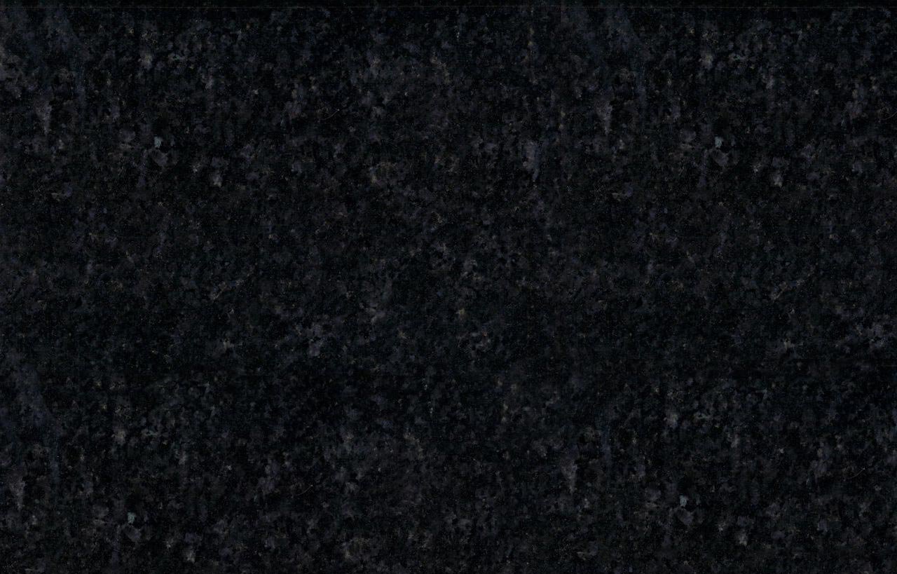 Close up slab photo of Black Pearl Granite showing a dark base with shimmering flecks and natural crystal patterning.