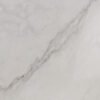 Statuario Venato Porcelain slab detail with a stronger grey diagonal vein and fine branching lines on a pale background.