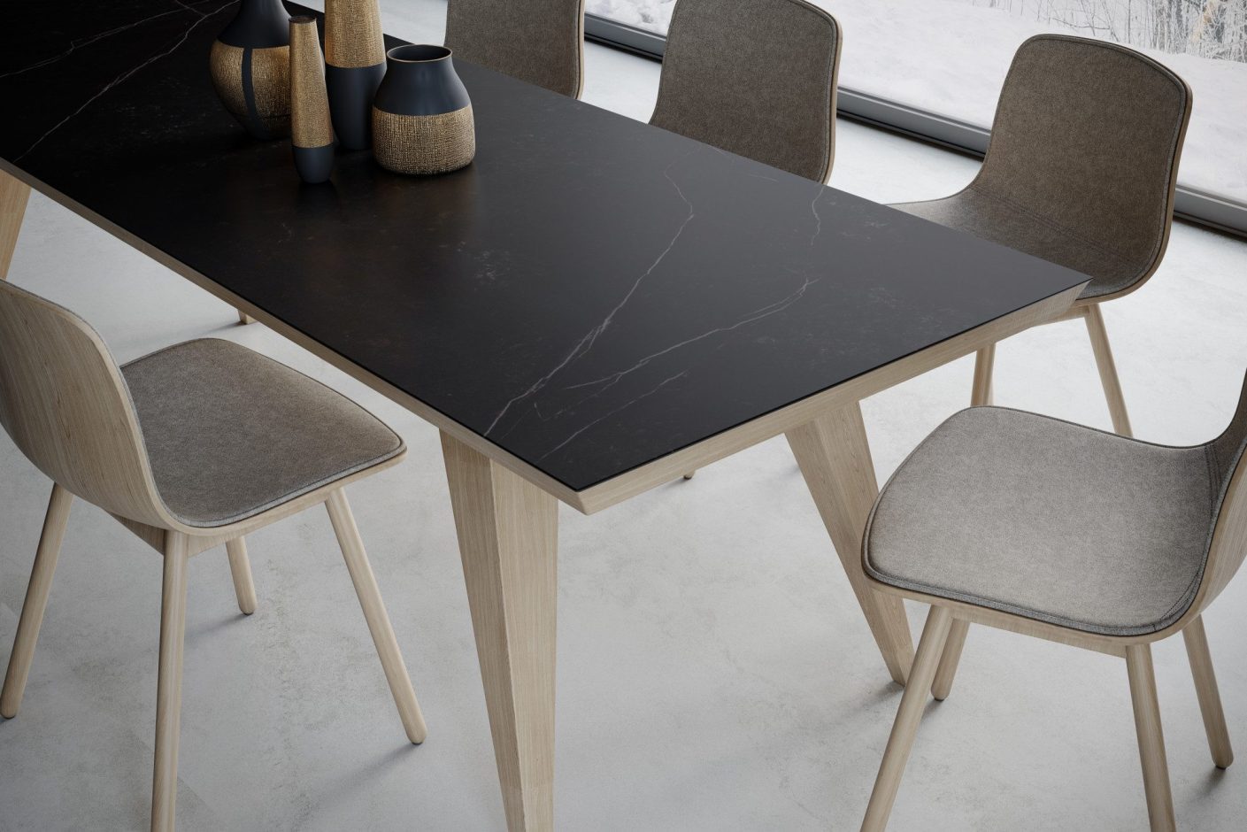 Kelya Porcelain tabletop in deep charcoal with a diagonal white vein, styled with dining chairs