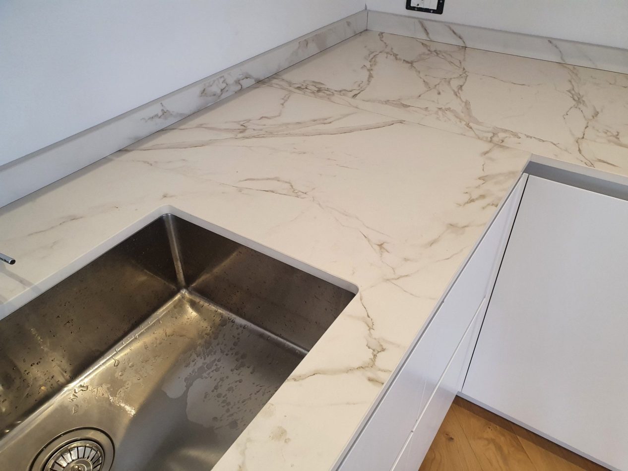 Entzo Porcelain worktop with integrated sink cut out and marble style veining