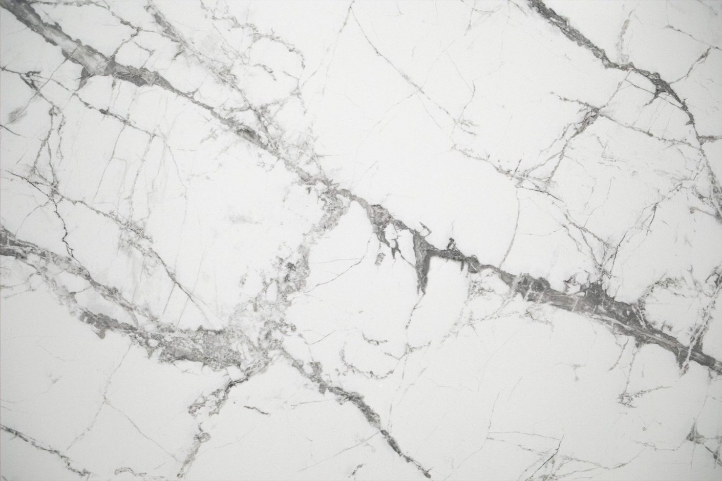 Invisible White Porcelain surface detail with soft grey veining pattern