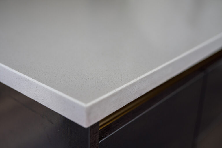 Imperial White Quartz worktop corner close-up showing the polished edge and smooth surface finish