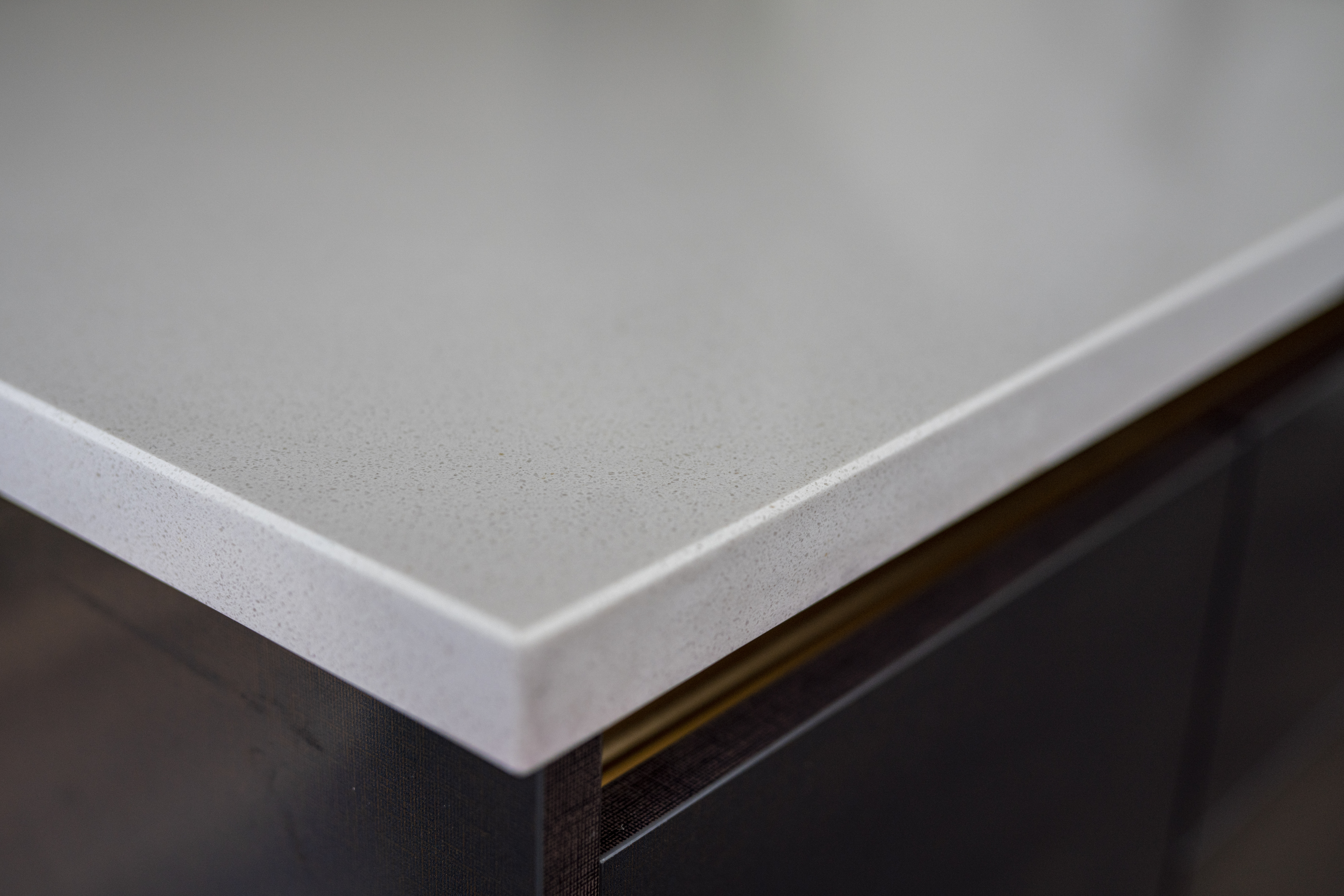 Imperial White Quartz worktop corner close-up showing the polished edge and smooth surface finish