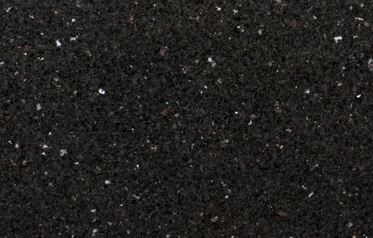 Close up slab photo of Nero Cosmos Granite showing a deep black base with fine sparkling flecks and natural crystal patterning.
