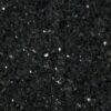 Close up slab photo of Star Galaxy Granite showing a deep black base with dense sparkling flecks and natural crystal patterning.