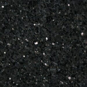 Close up slab photo of Star Galaxy Granite showing a deep black base with dense sparkling flecks and natural crystal patterning.