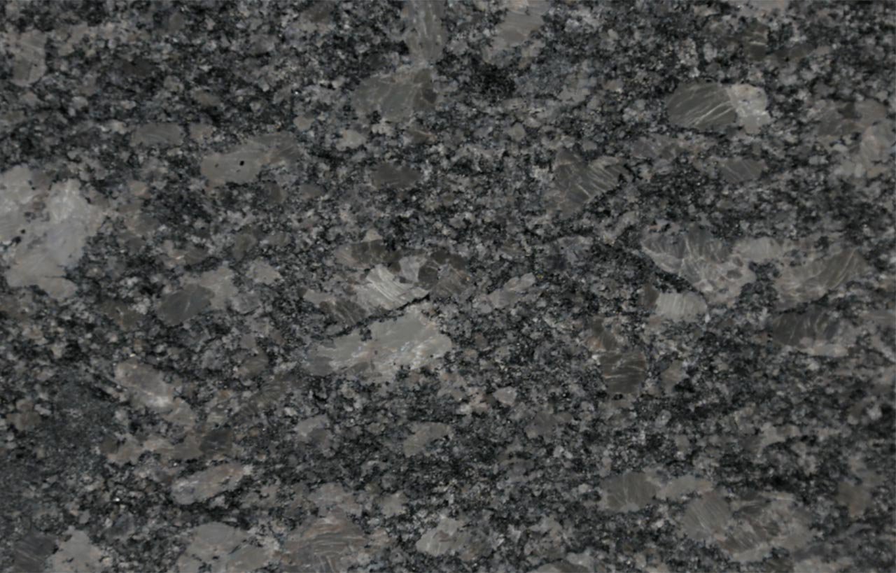 Close up slab photo of Steel Grey Granite showing a mottled grey pattern with natural crystal movement and fine grain texture.