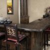 Bar area view with Tan Brown Granite worktop, showing the polished Granite surface on a curved edge with bar stools and ambient lighting.