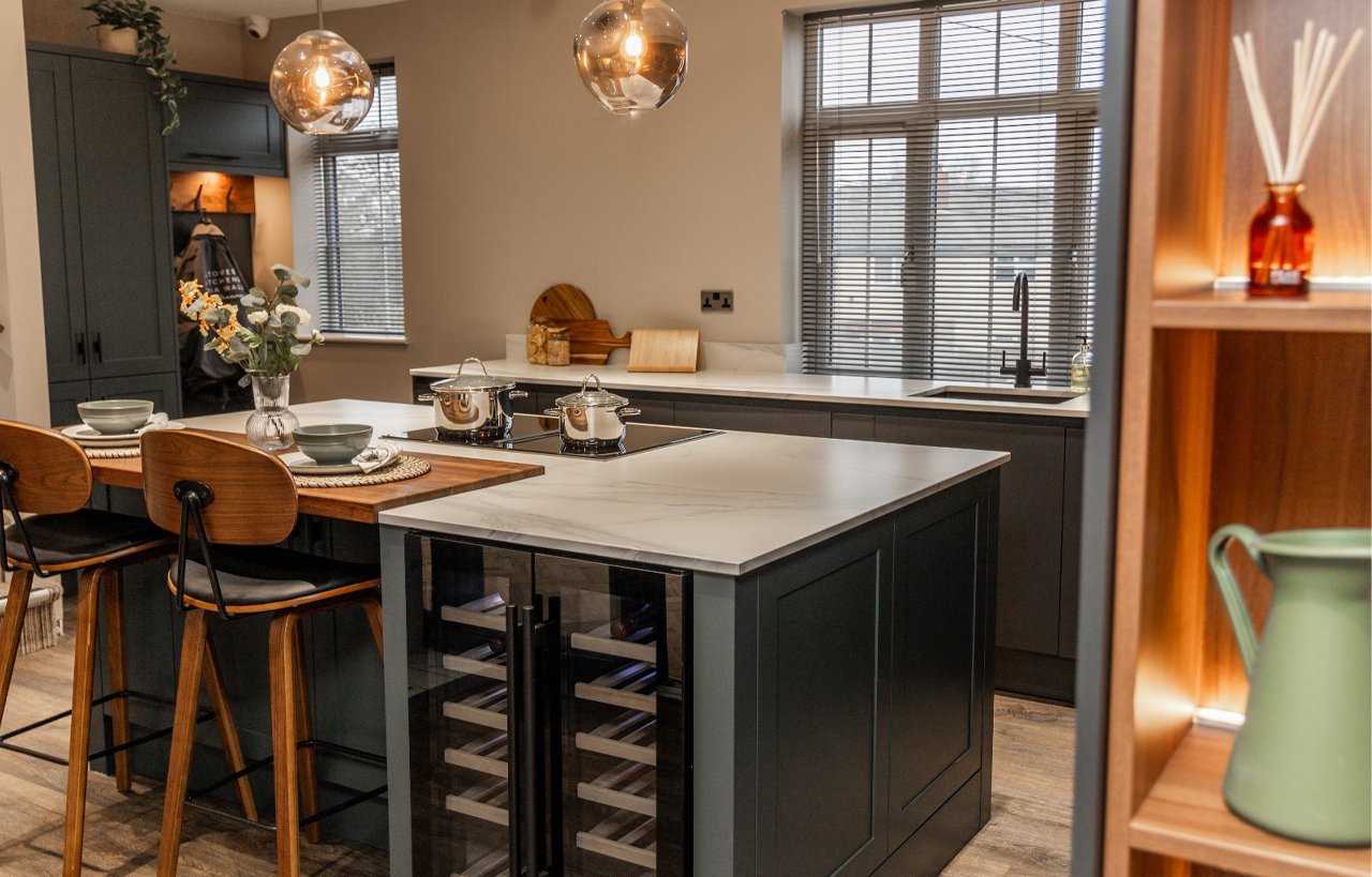 Laurent Porcelain kitchen island worktop installed with a dark stone-look finish and subtle veining, shown in a modern kitchen setting.