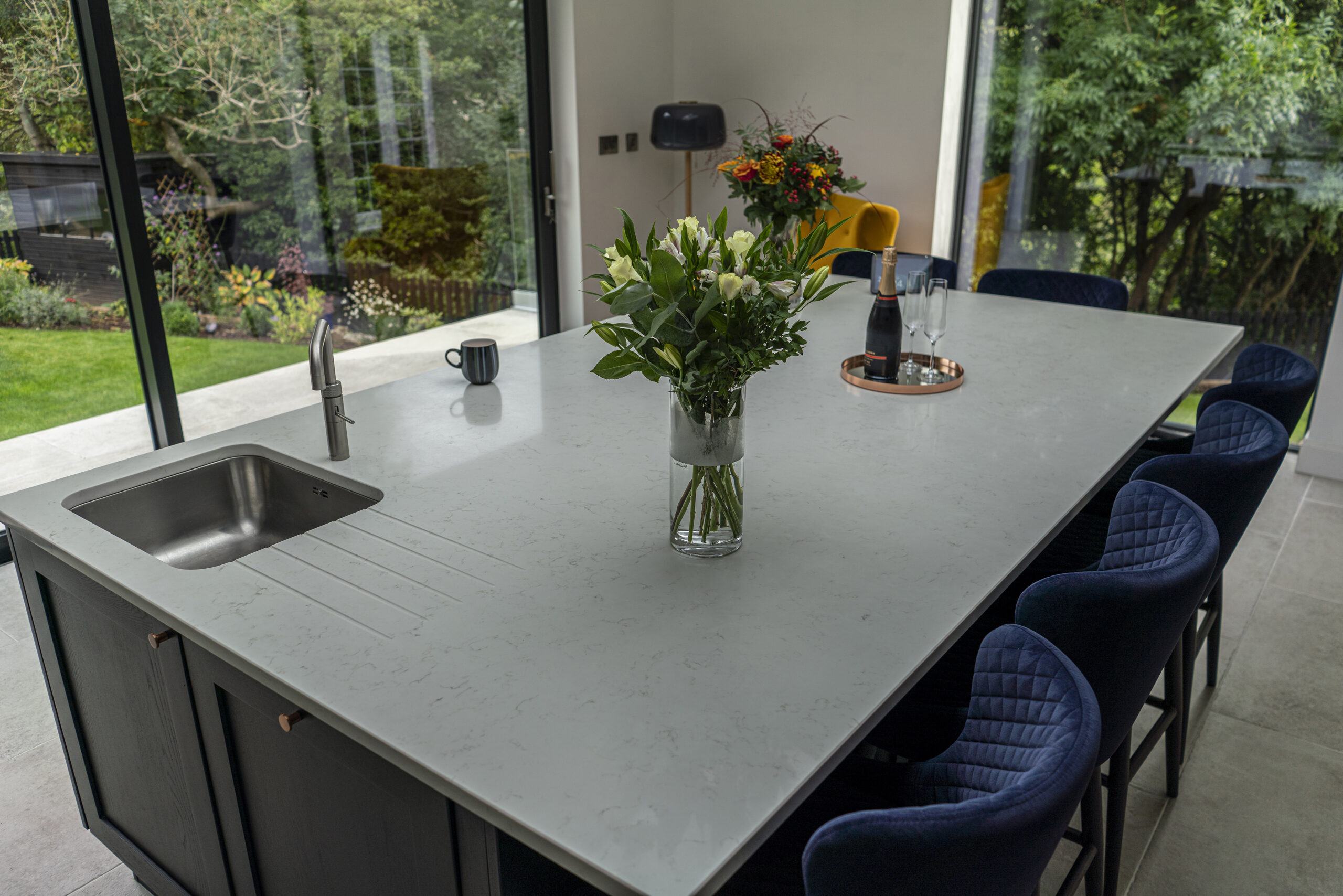 Carrara Quartz worktops in a modern kitchen with subtle grey veining