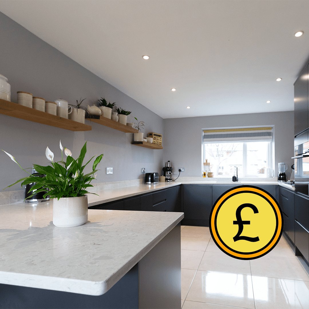 Grey Drift Quartz peninsula worktop with clean edge detail and pale stone-effect pattern in a modern kitchen